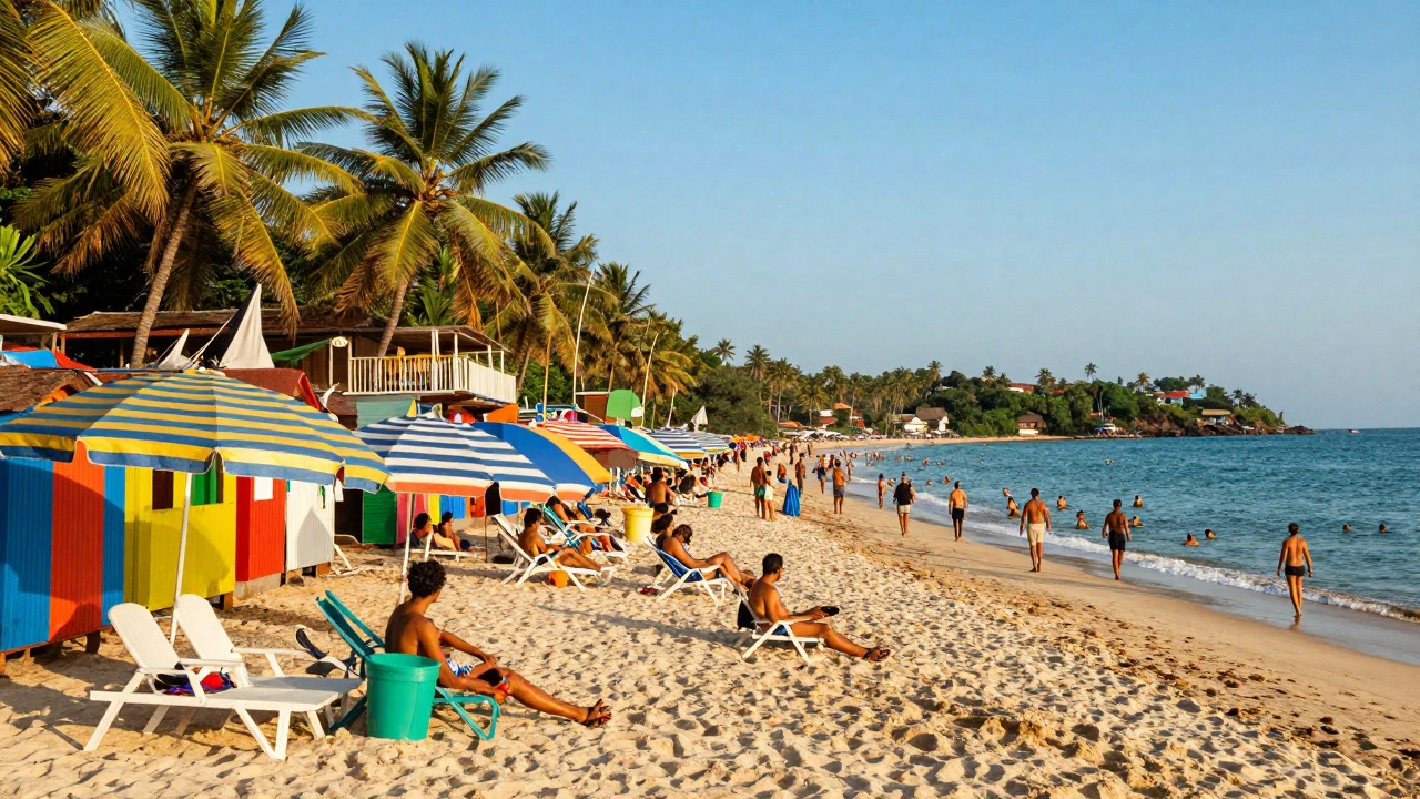 Colorful beach shacks and crowds on a sunny day in Goa