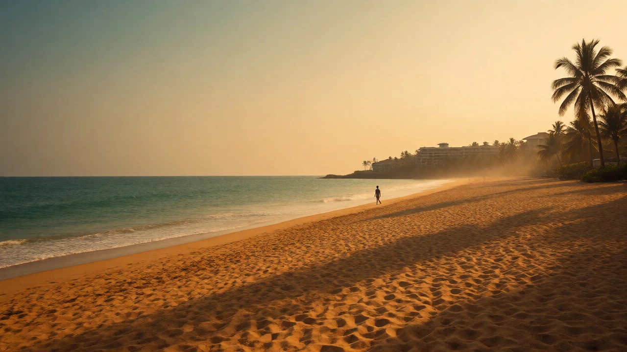 Empty South Goa beach at sunrise with calm waters and golden lighting